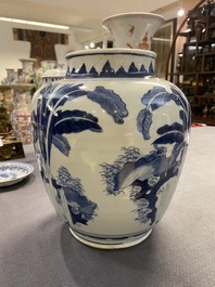 A Chinese blue and white vase with narrative design on wooden stand, Transitional period